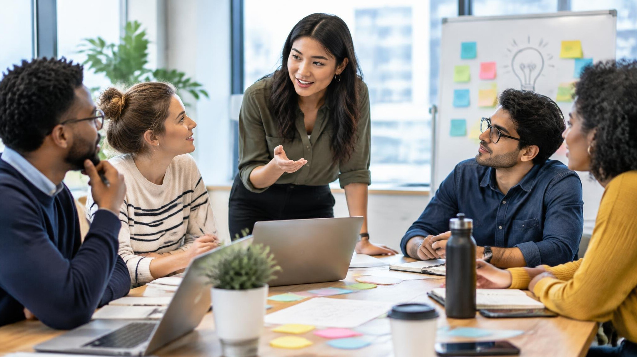 young professionals in office meeting